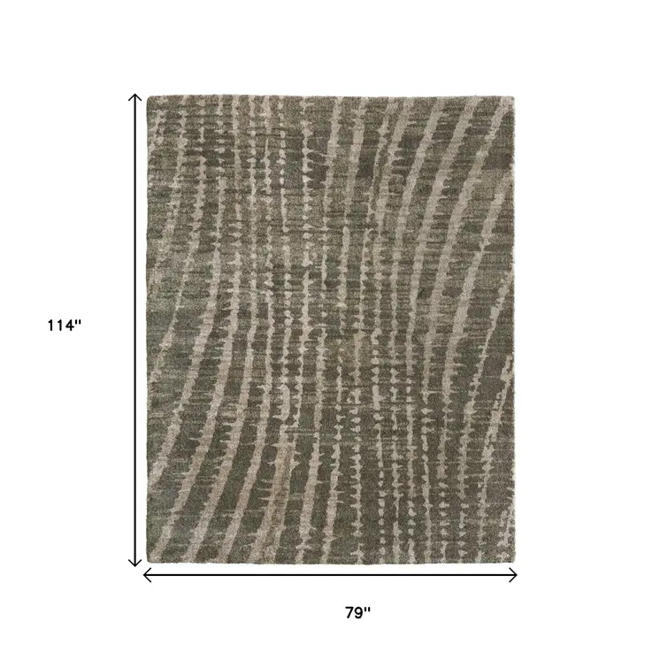 7' X 10' Green And Tan Abstract Area Rug