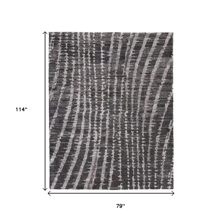 7' X 10' Black Gray And Ivory Abstract Area Rug