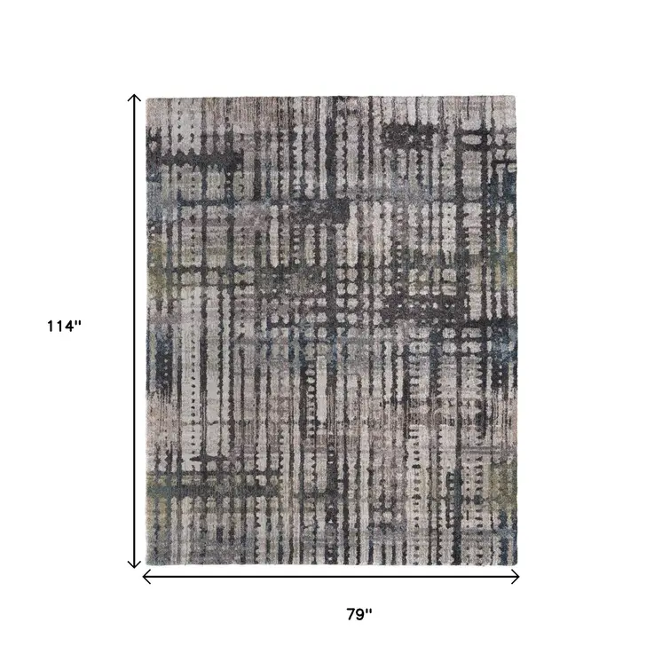 7' X 10' Gray Black And Ivory Abstract Distressed Area Rug