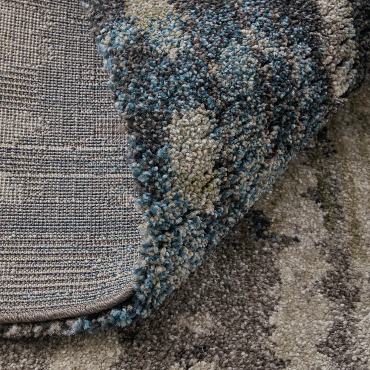 7' X 10' Gray Black And Ivory Abstract Distressed Area Rug