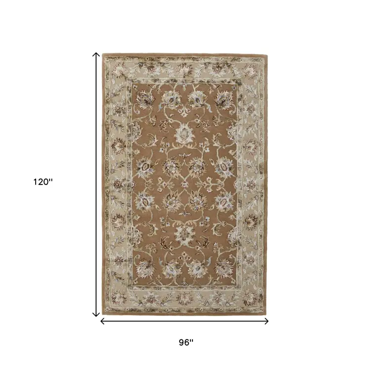 8' X 10' Tan And Ivory Floral Hand Tufted Area Rug