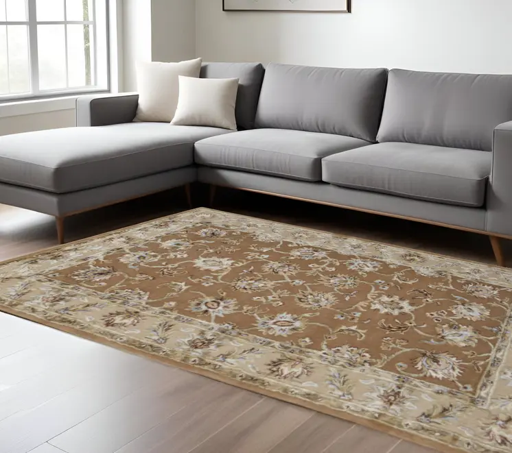 8' X 10' Tan And Ivory Floral Hand Tufted Area Rug
