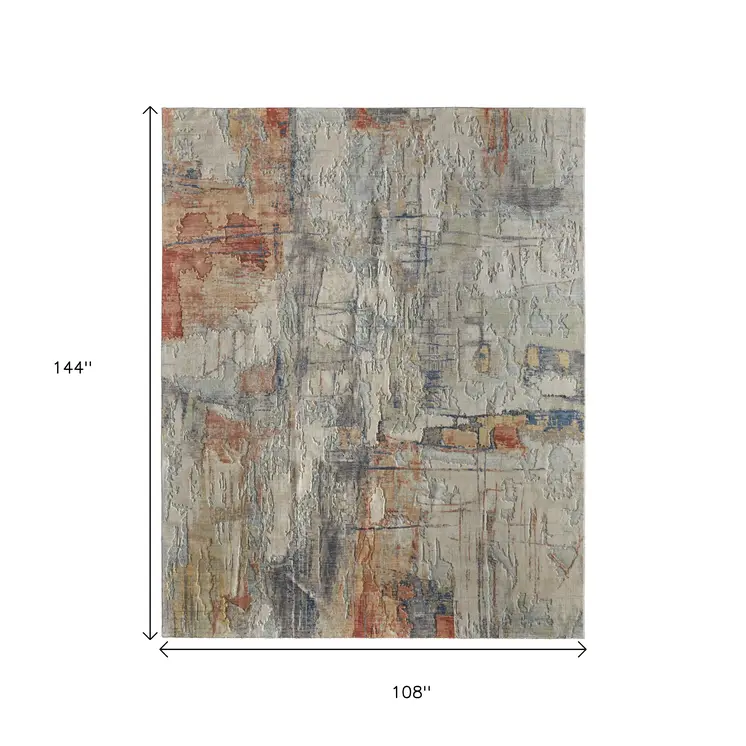 9' X 12' Gray Orange And Ivory Abstract Distressed Area Rug