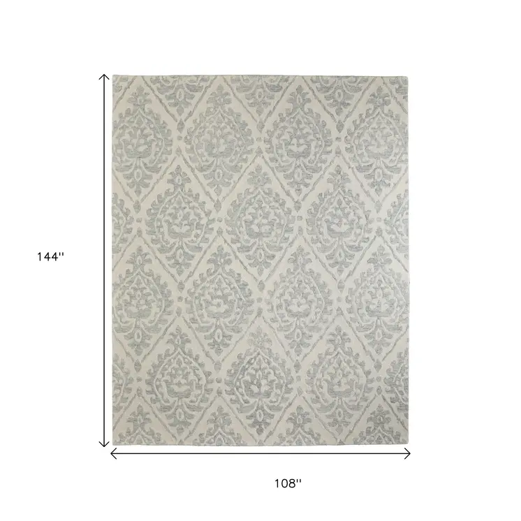 9' X 12' Ivory And Gray Floral Hand Tufted Area Rug