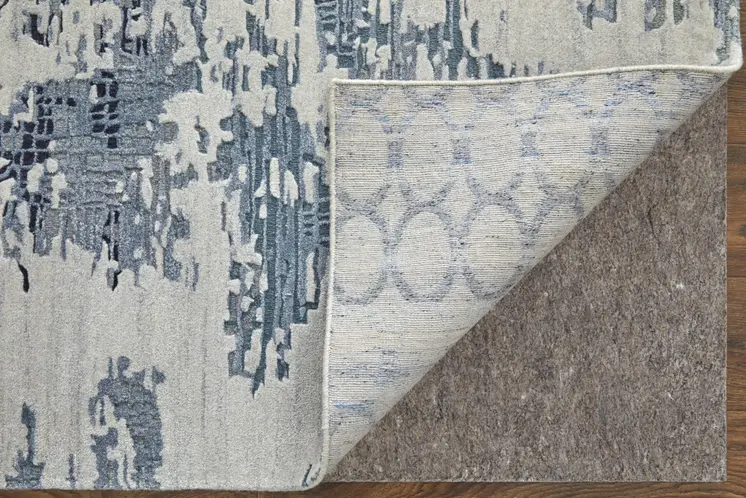 9' X 12' Blue And Ivory Abstract Hand Tufted Area Rug