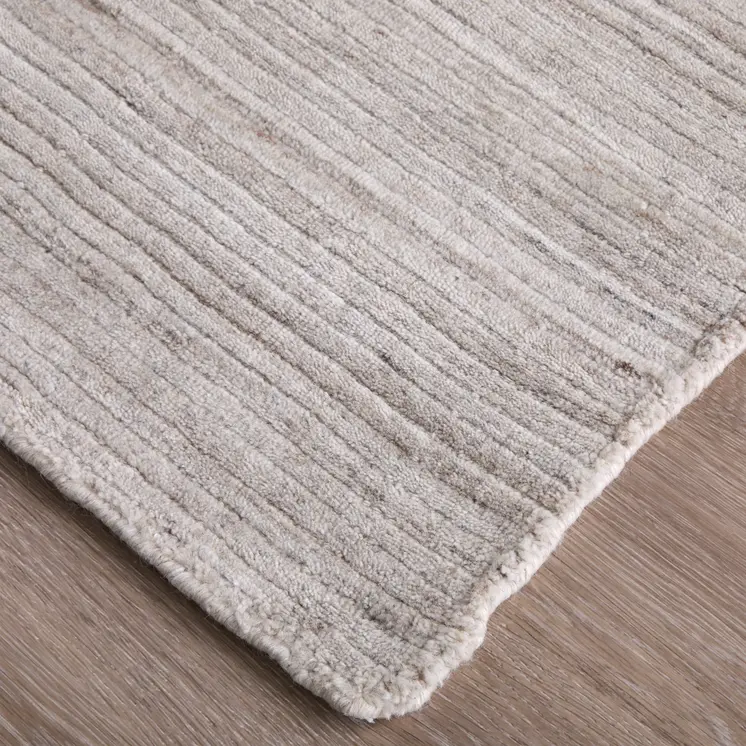 8' X 10' Ivory And Tan Hand Woven Distressed Area Rug
