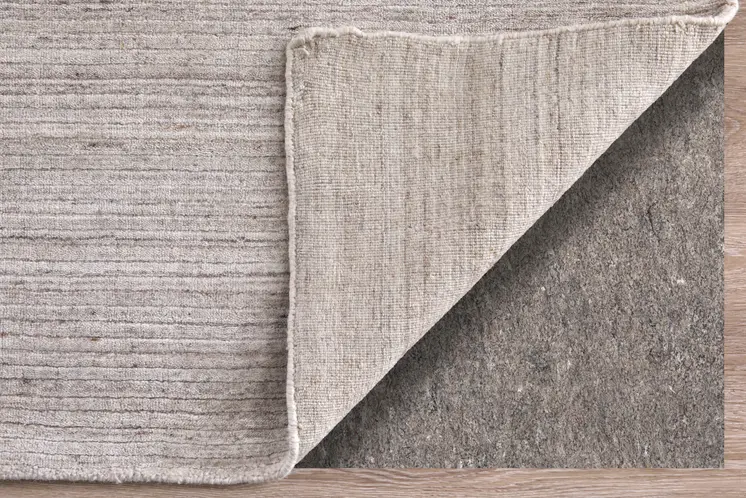 8' X 10' Ivory And Tan Hand Woven Distressed Area Rug