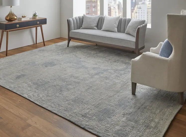 9' X 12' Silver And Gray Abstract Hand Woven Distressed Area Rug