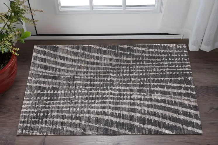 2' X 3' Black Gray And Ivory Abstract Area Rug