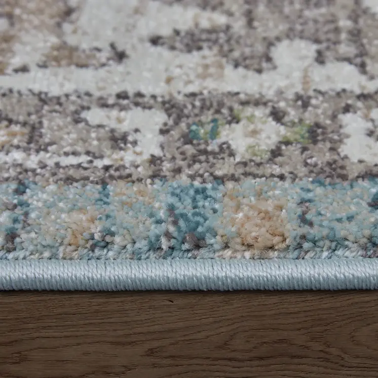 5' X 8' Blue Ivory And Brown Floral Distressed Area Rug