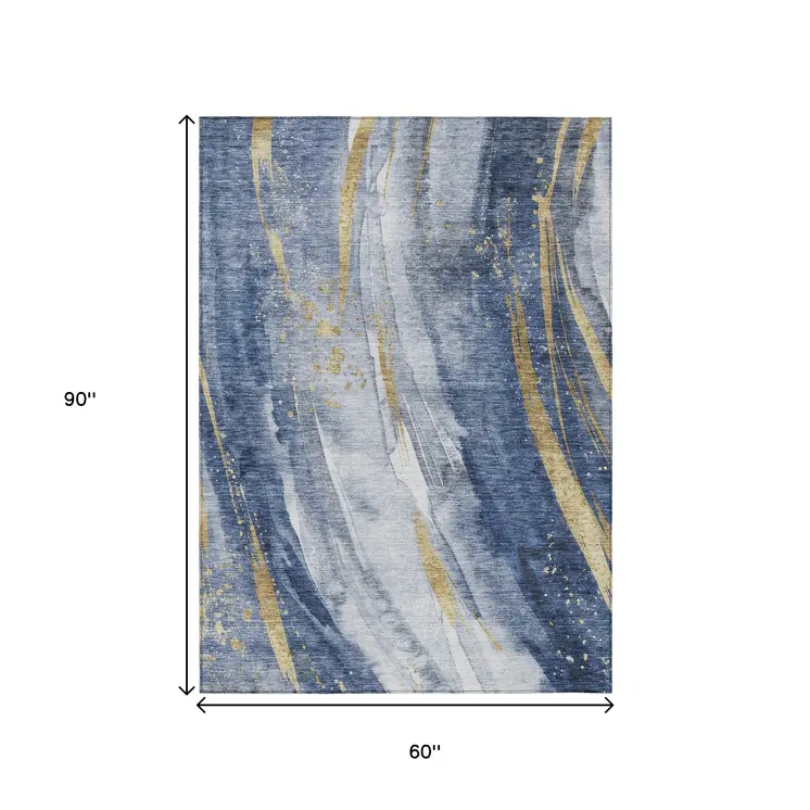 5' X 8' Blue Gold And Ivory Abstract Washable Indoor Outdoor Area Rug