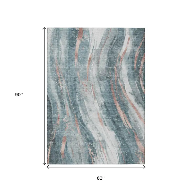 5' X 8' Teal Blue Salmon And Ivory Abstract Washable Indoor Outdoor Area Rug