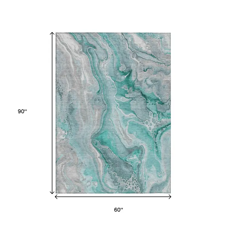5' X 8' Teal Blue And Ivory Abstract Washable Indoor Outdoor Area Rug