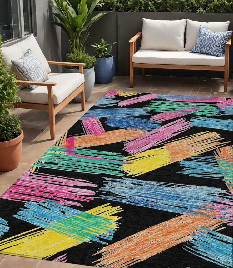 5' X 8' Black Pink Yellow Orange And Blue Striped Washable Indoor Outdoor Area Rug