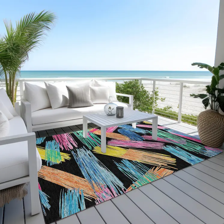 8' X 10' Black Pink Yellow Orange And Blue Striped Washable Indoor Outdoor Area Rug