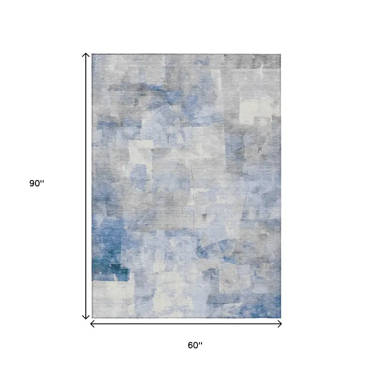 5' X 8' Denim Blue Gray And Ivory Abstract Washable Indoor Outdoor Area Rug