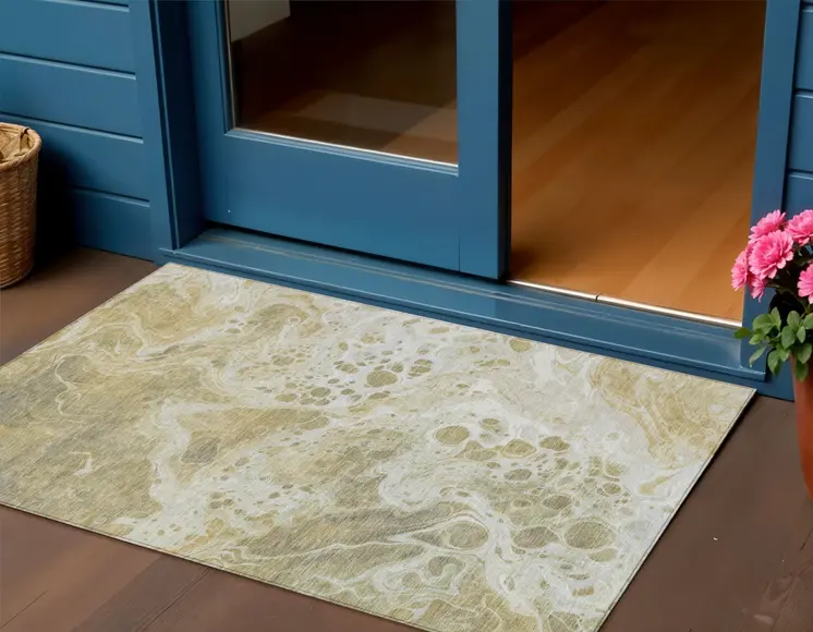3' X 5' Gold And Ivory Abstract Washable Indoor Outdoor Area Rug