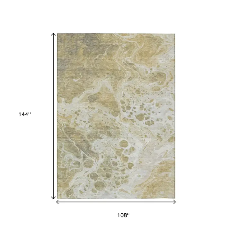 9' X 12' Gold And Ivory Abstract Washable Indoor Outdoor Area Rug