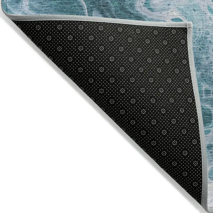 9' X 12' Teal Blue And Ivory Abstract Washable Indoor Outdoor Area Rug