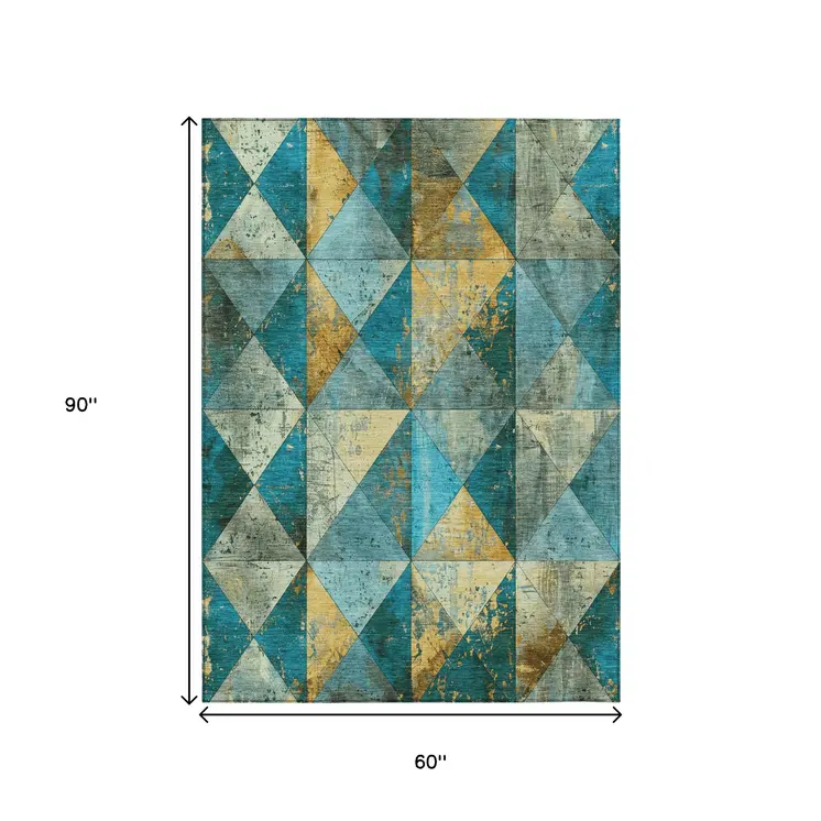 5' X 8' Teal Blue And Gold Geometric Washable Indoor Outdoor Area Rug