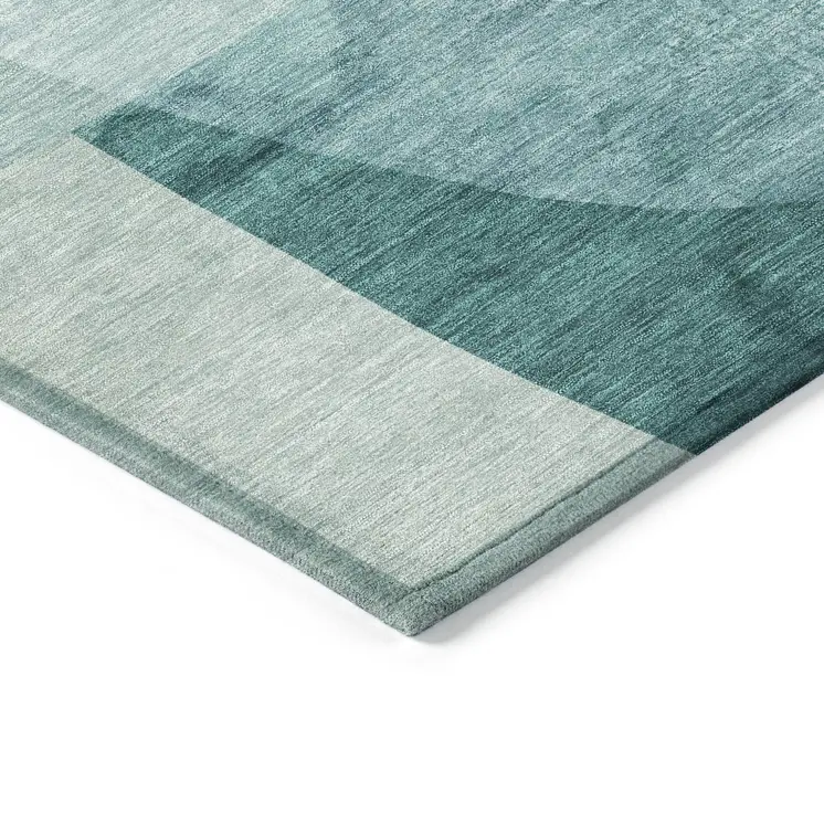 5' X 8' Teal Blue And Ivory Abstract Washable Indoor Outdoor Area Rug