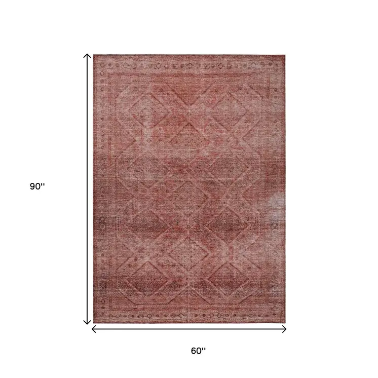 5' X 8' Pink And Ivory Geometric Washable Indoor Outdoor Area Rug
