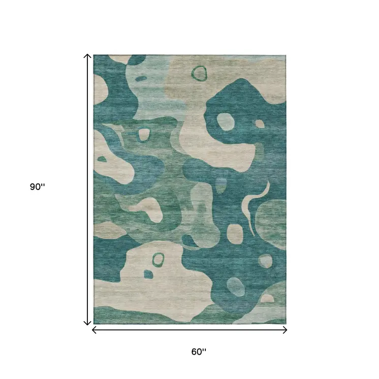 5' X 8' Teal Blue Ivory And Beige Abstract Washable Indoor Outdoor Area Rug