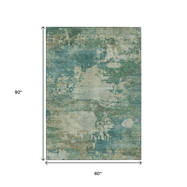 5' X 8' Teal Blue Beige And Denim Blue Abstract Washable Indoor Outdoor Area Rug