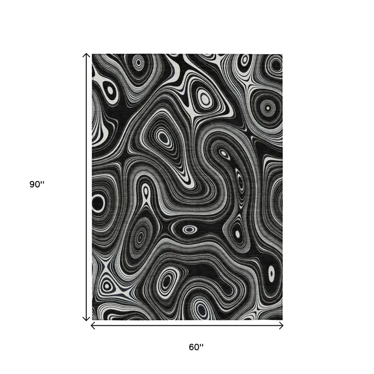 5' X 8' Black And Ivory Geometric Washable Indoor Outdoor Area Rug