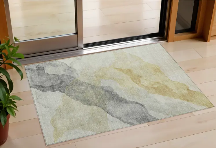 3' X 5' Beige And Gold Abstract Washable Indoor Outdoor Area Rug