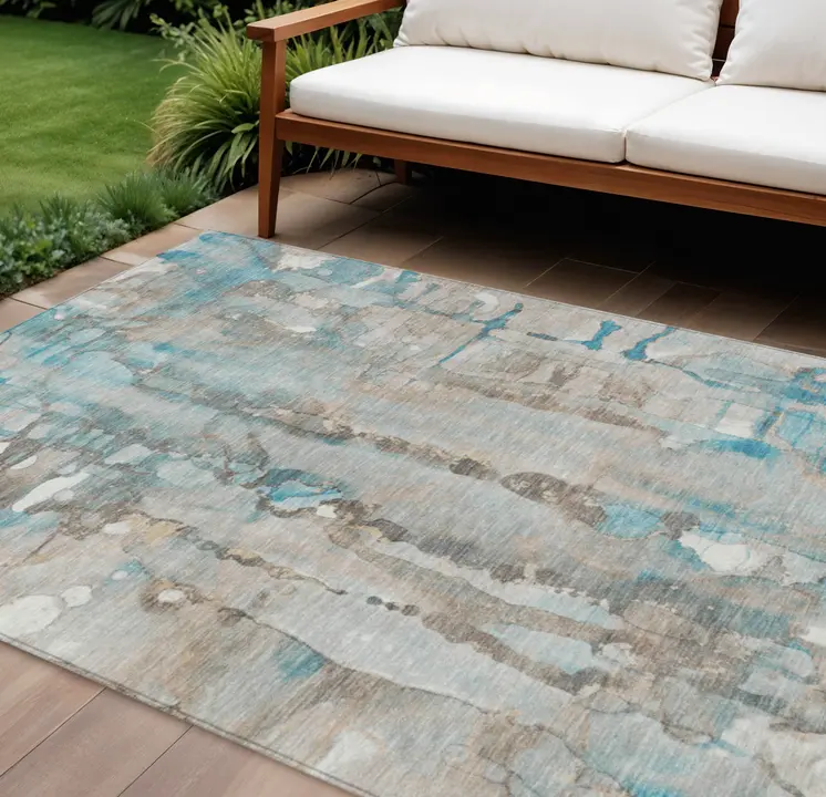 9' X 12' Teal Blue And Ivory Abstract Washable Indoor Outdoor Area Rug