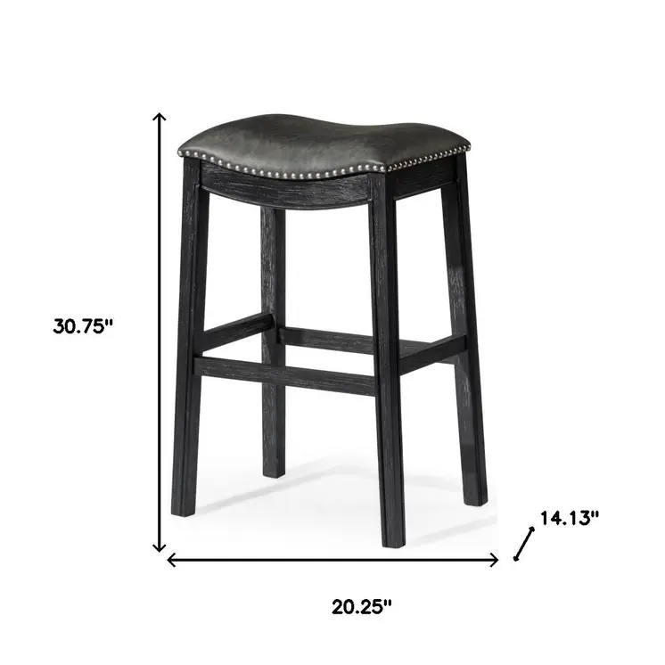 31" Charcoal and Black Faux Leather and Solid Wood Backless Bar Height Bar Chair