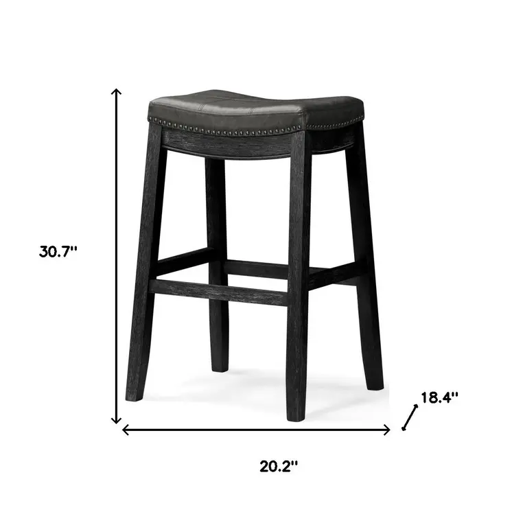 31" Charcoal and Black Faux Leather and Solid Wood Backless Bar Height Bar Chair