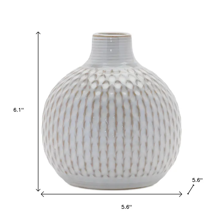 Set of Four Natural And Off White Ceramic Bud Vases With Sculptural Details
