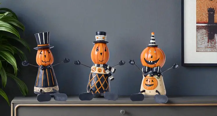 Set of Three Orange And Black Polyresin Tabletop Sculpture