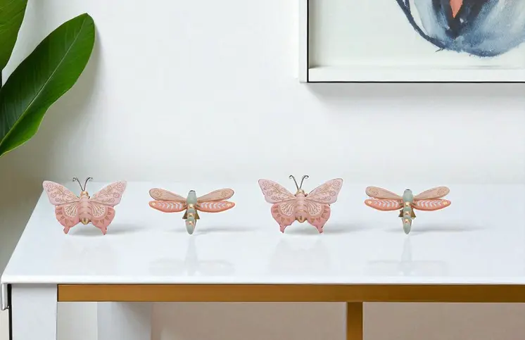 Set of Four Pink And Green Polyresin Tabletop Sculpture