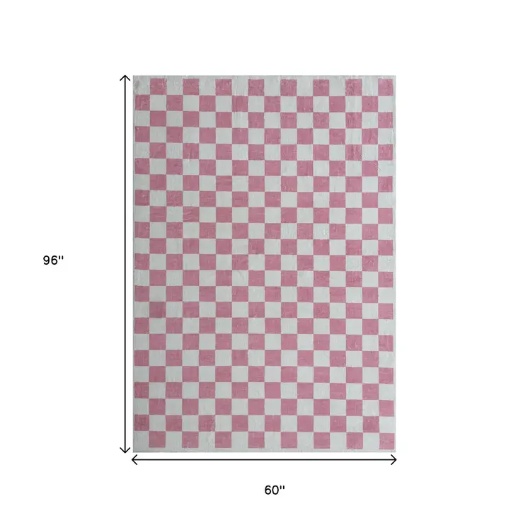 5' X 8' Pink And Off White Checkered Area Rug