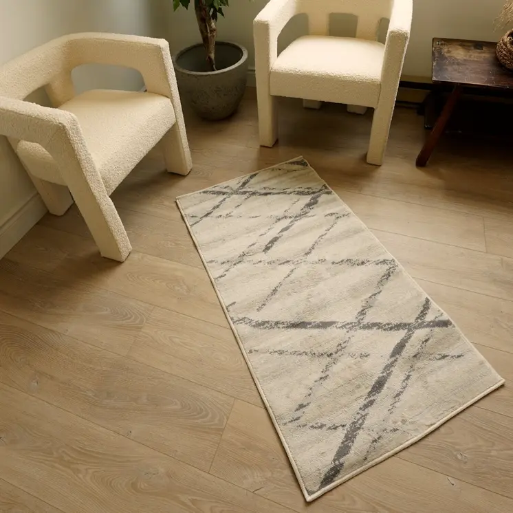 2' X 5' Beige And Gray Abstract Area Rug