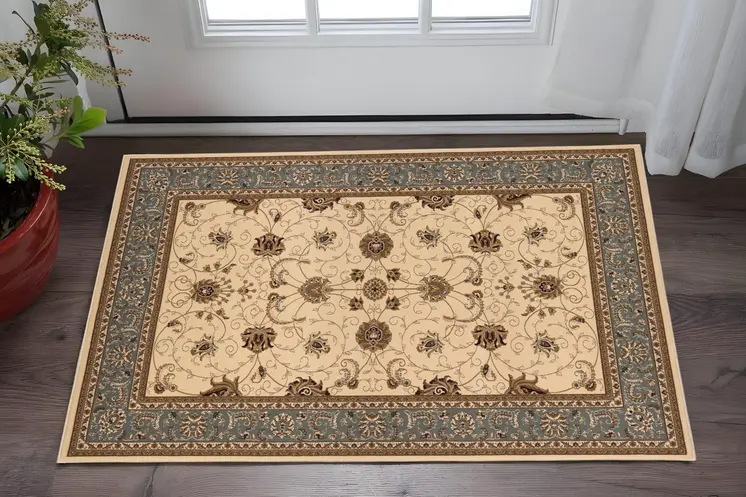 2' X 4' Beige And Cream Oriental Area Rug