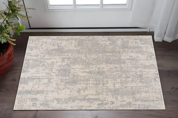 2' X 4' Gray And Beige Abstract Area Rug