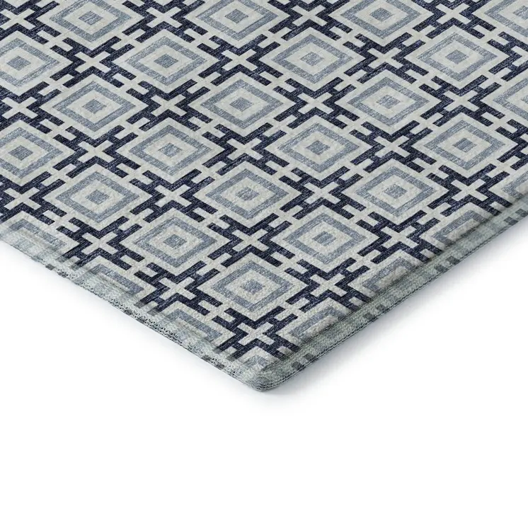 3' X 5' Navy Blue And Ivory Geometric Washable Area Rug With UV Protection