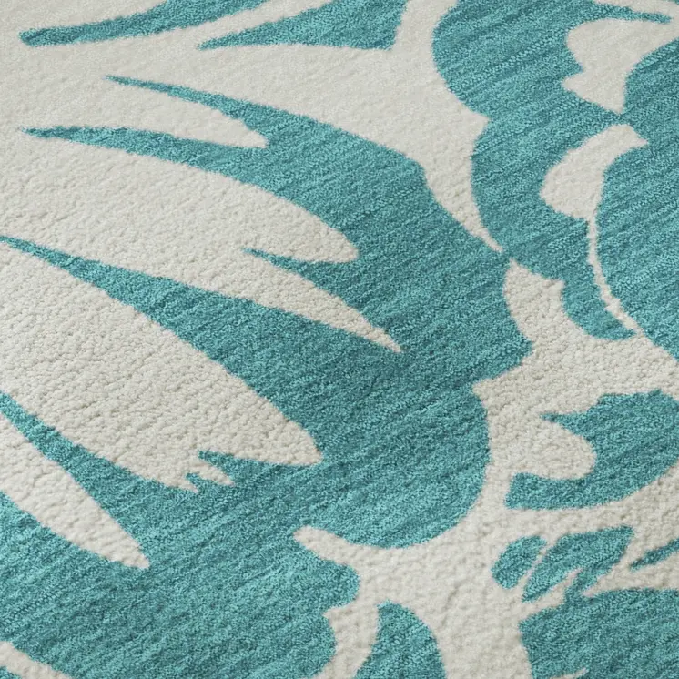 10' X 14' Teal And Ivory Floral Washable Area Rug With UV Protection