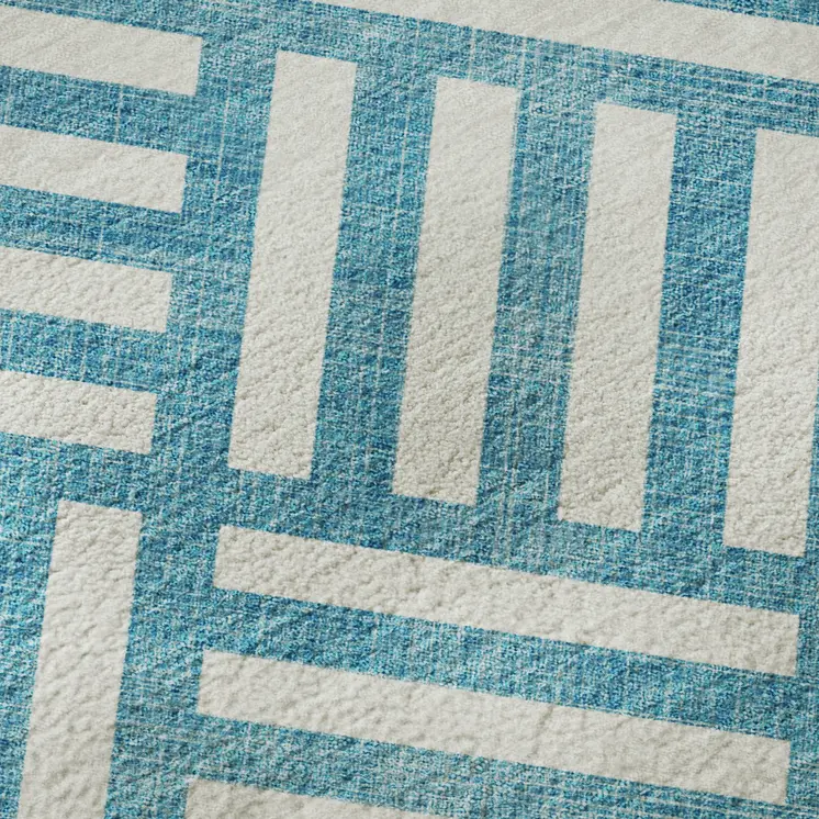 5' X 8' Teal And Ivory Geometric Washable Area Rug With UV Protection