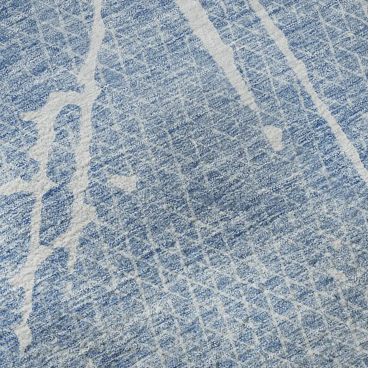 9' X 12' Blue And Ivory Abstract Washable Area Rug With UV Protection