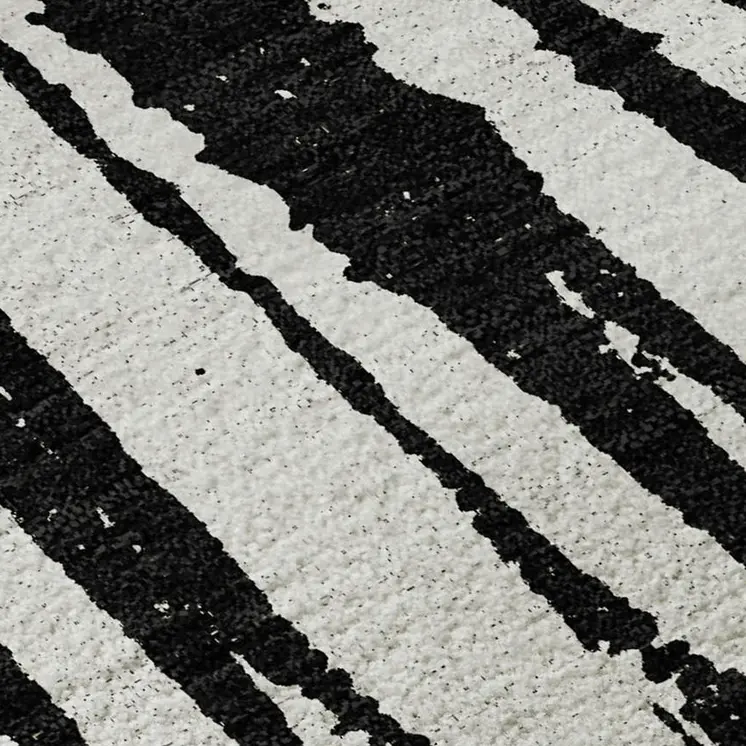 9' X 12' Black And Ivory Abstract Washable Area Rug With UV Protection