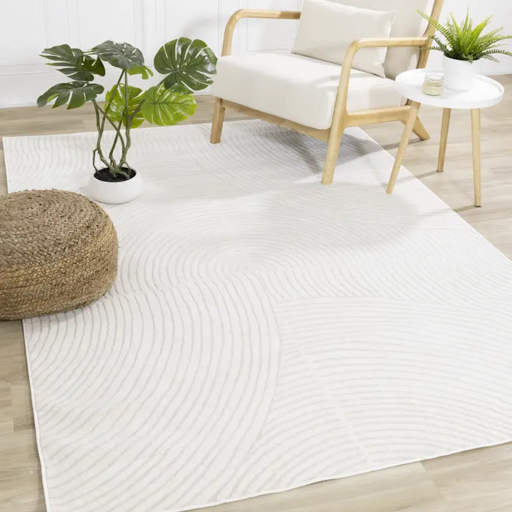 7' X 10' Cream And Beige Geometric Area Rug